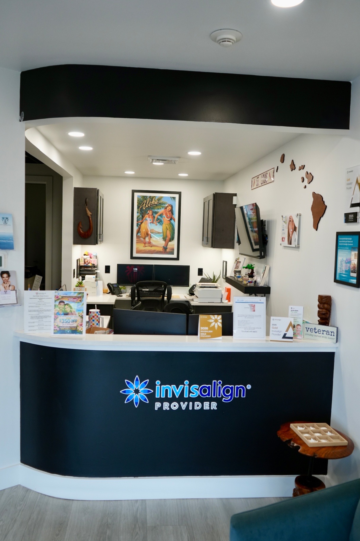 Sand Dollar Dental reception desk with Invisalign Provider signage